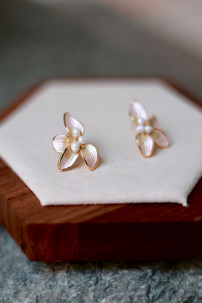 Pearl petal earrings worn by model