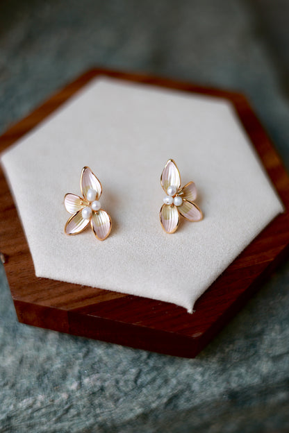 Pearl petal floral earrings front view