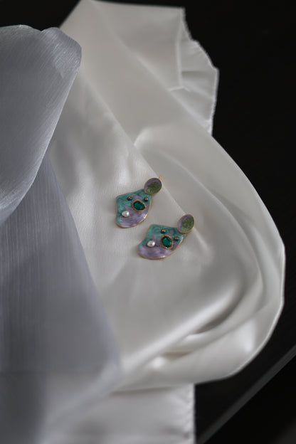Iridescent dream enamel earrings on model