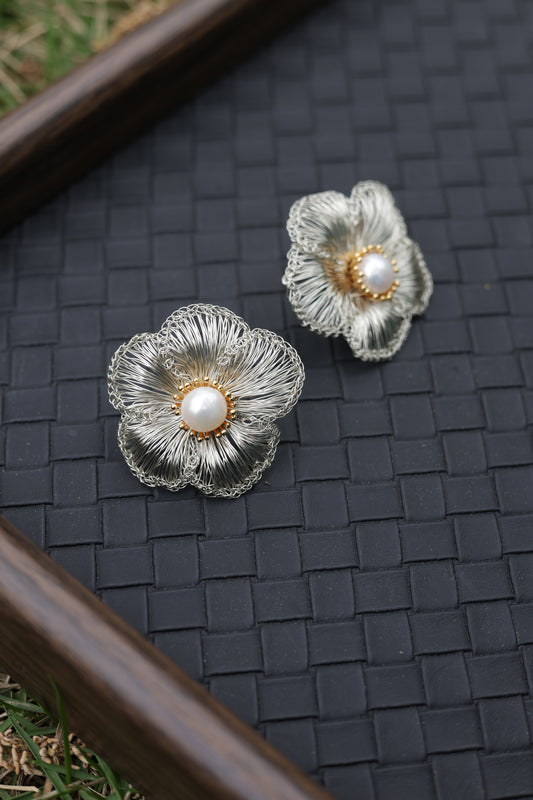 Silver petal pearl earrings front view