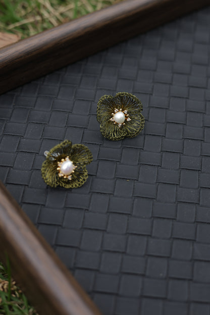 Moss green petal pearl earrings detail close-up
