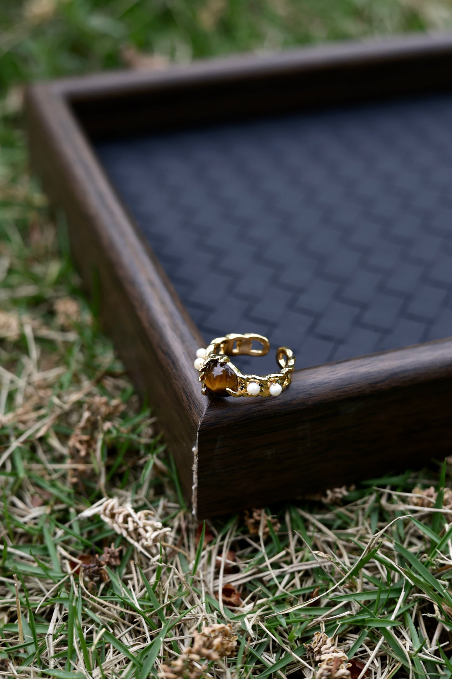 Amber stone pearl ring lifestyle shot