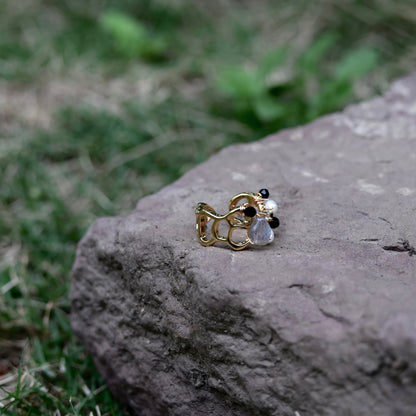 Stone cluster pearl ring lifestyle shot