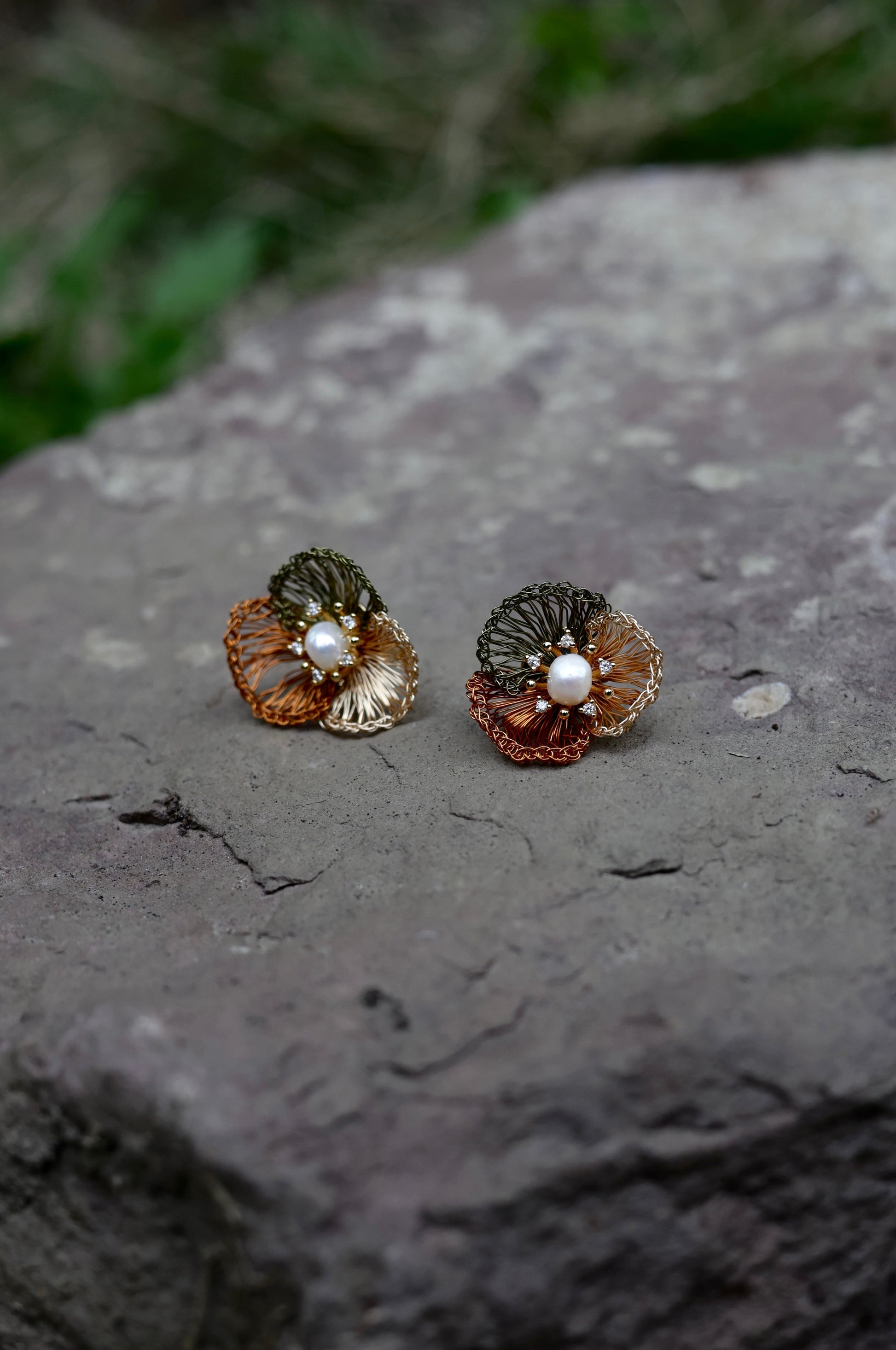 Earth tone petal pearl earrings front view
