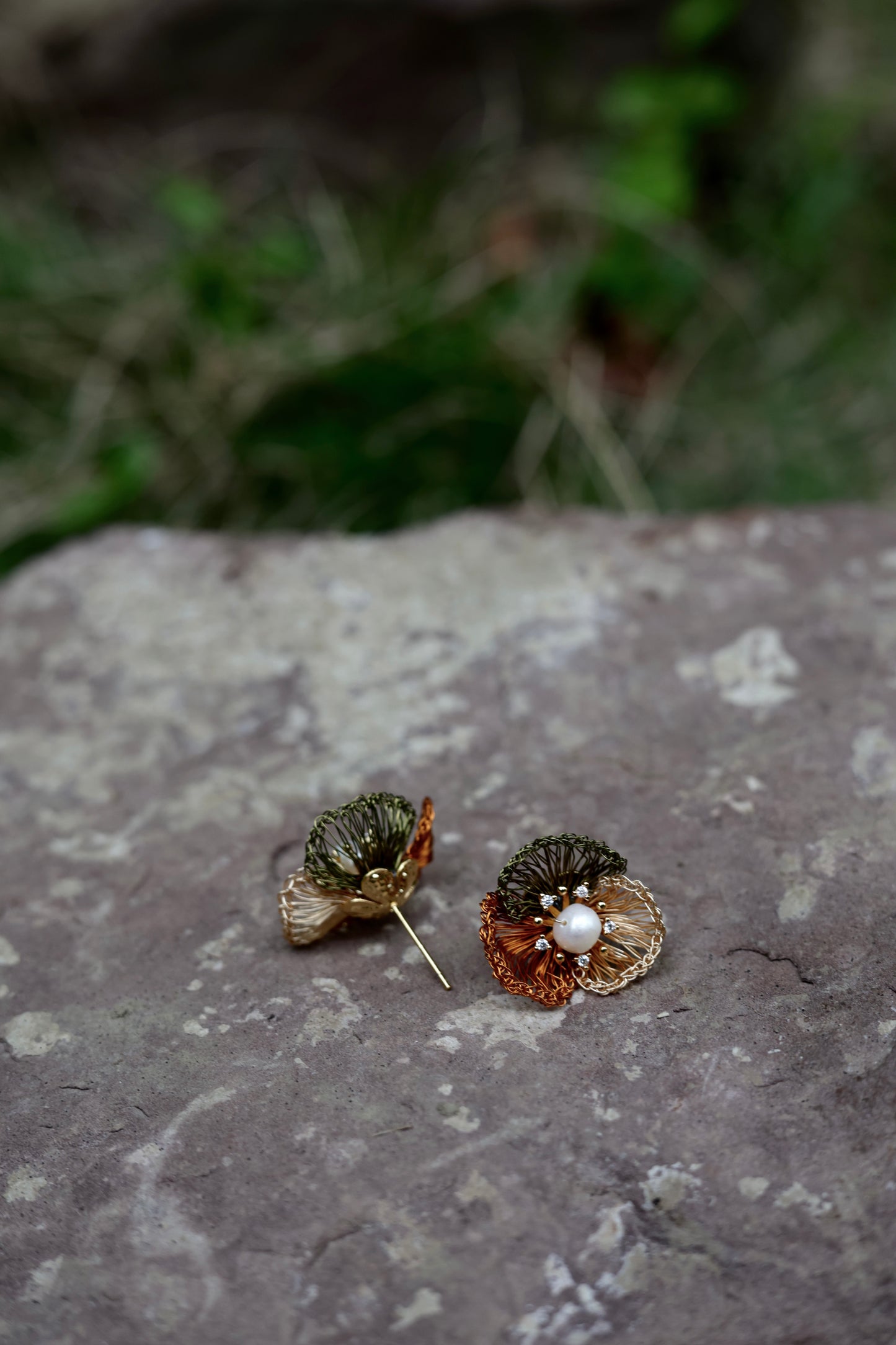 Earth tone petal pearl earrings detail